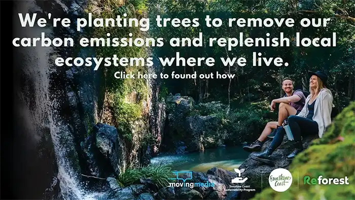 A couple enjoying the outdoors, sitting in a river bank. Message says 'We're planting trees to remove our local carbon emissions and replenish our local ecosystems where we live.